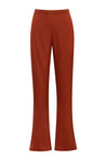 Pantalón Numa terracota con corte wide-leg, tela texturizada y cremallera lateral.