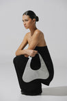Top Suzu strapless de Baobab, soporte con elástico superior y acabado brillante.